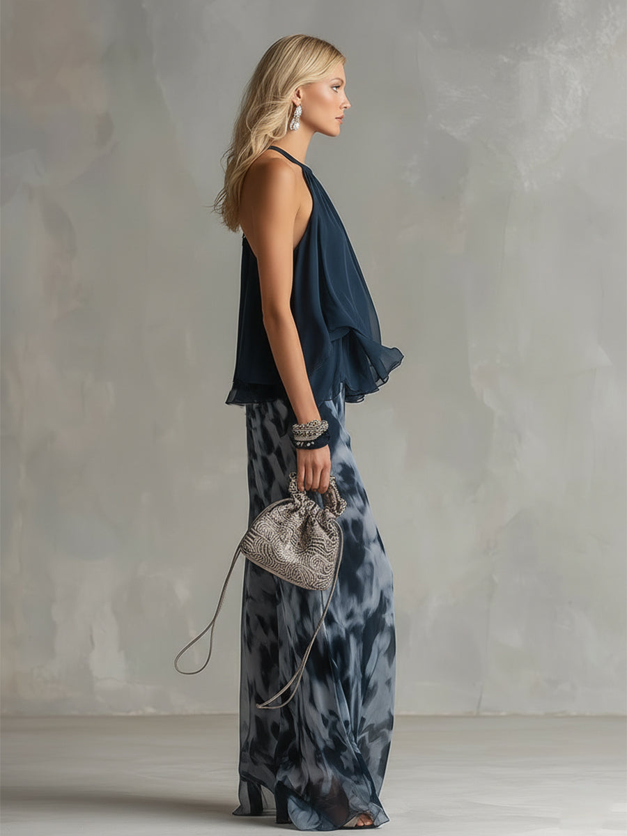 Luisa - Elegant chiffon dress with a high-necked top and wide-cut, patterned trousers.
