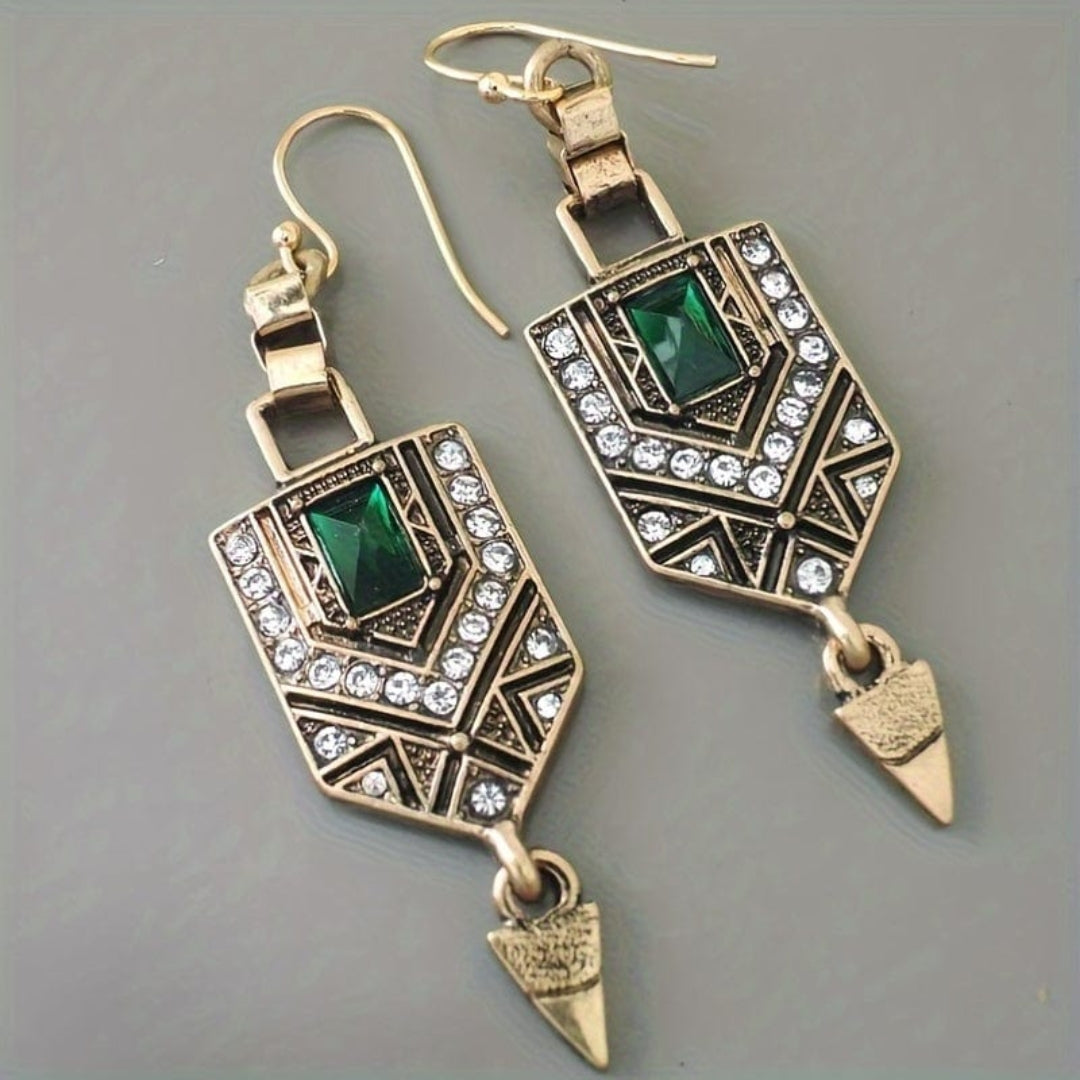 Boucles d'oreilles vintage en or avec des zircons verts