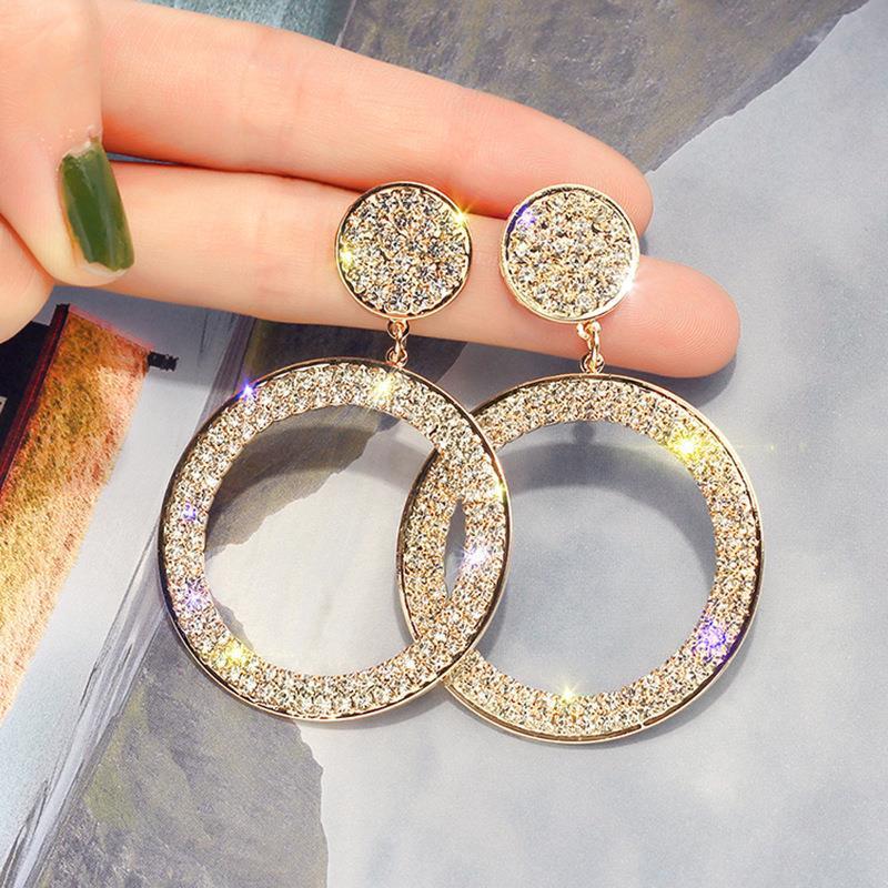 Boucles d'oreilles en zircone dorée et argentée