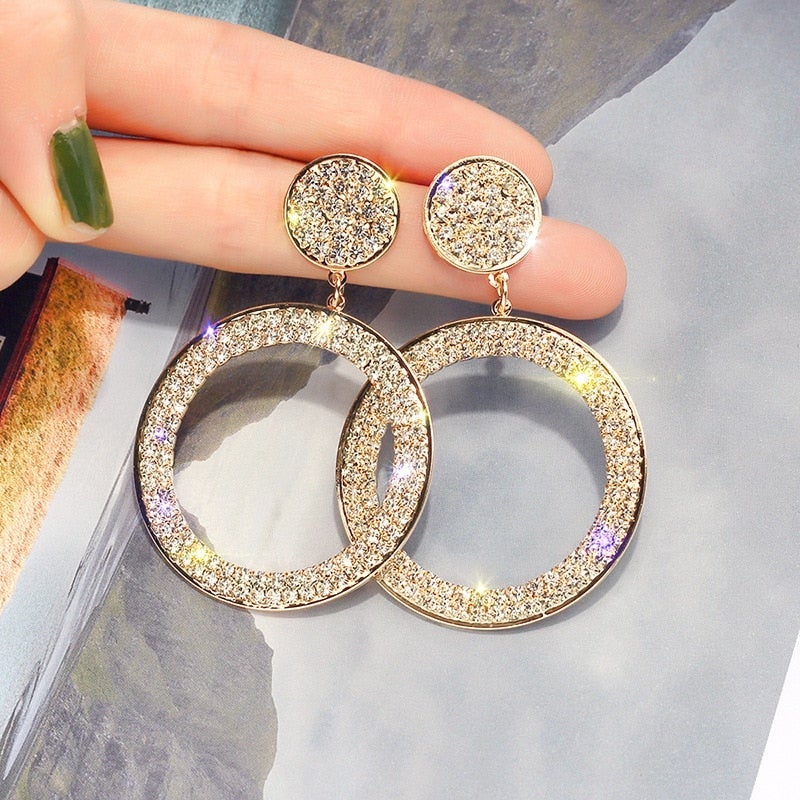 Boucles d'oreilles en zircone dorée et argentée