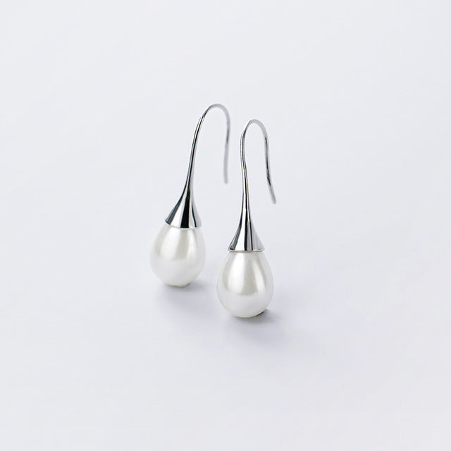 Bijou : boucles d'oreilles pendantes en perles