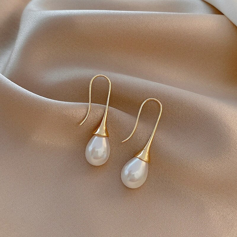 Bijou : boucles d'oreilles pendantes en perles