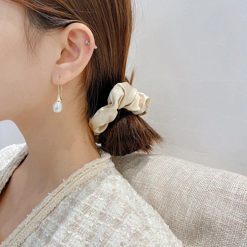 Bijou : boucles d'oreilles pendantes en perles