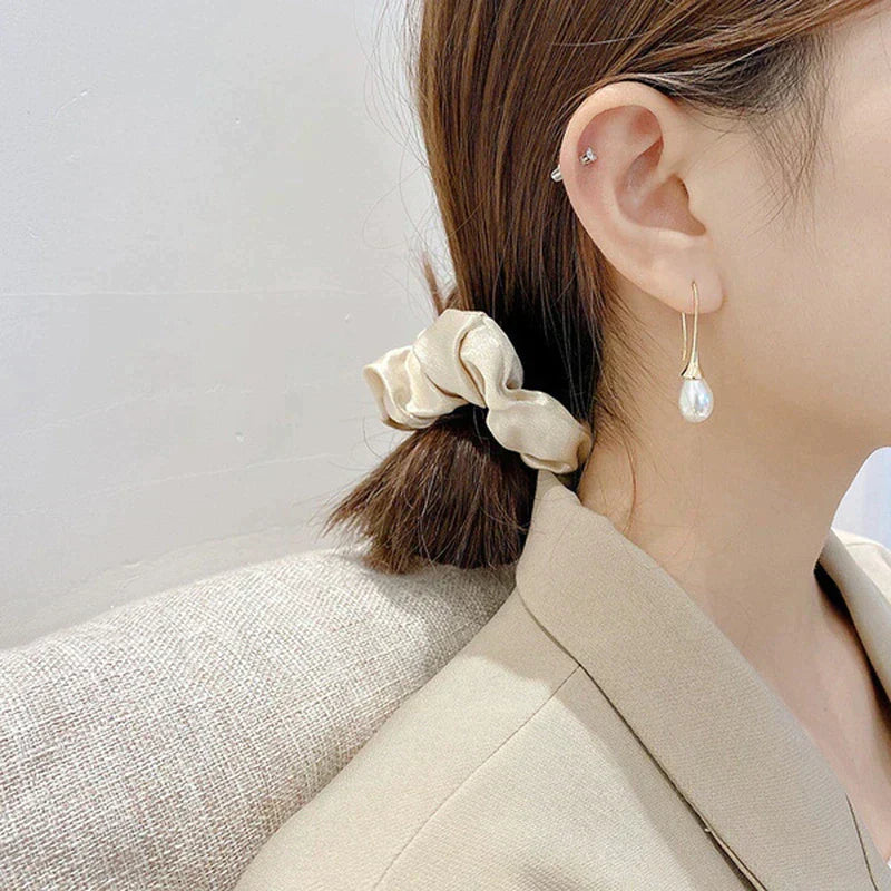 Bijou : boucles d'oreilles pendantes en perles