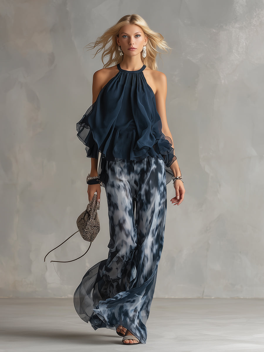 Luisa - Elegant chiffon dress with a high-necked top and wide-cut, patterned trousers.
