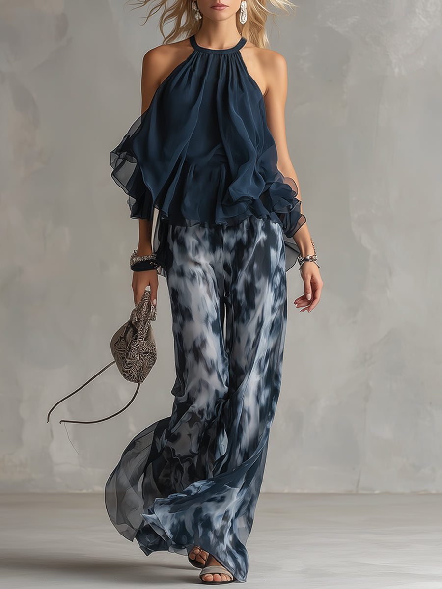 Luisa - Elegant chiffon dress with a high-necked top and wide-cut, patterned trousers.