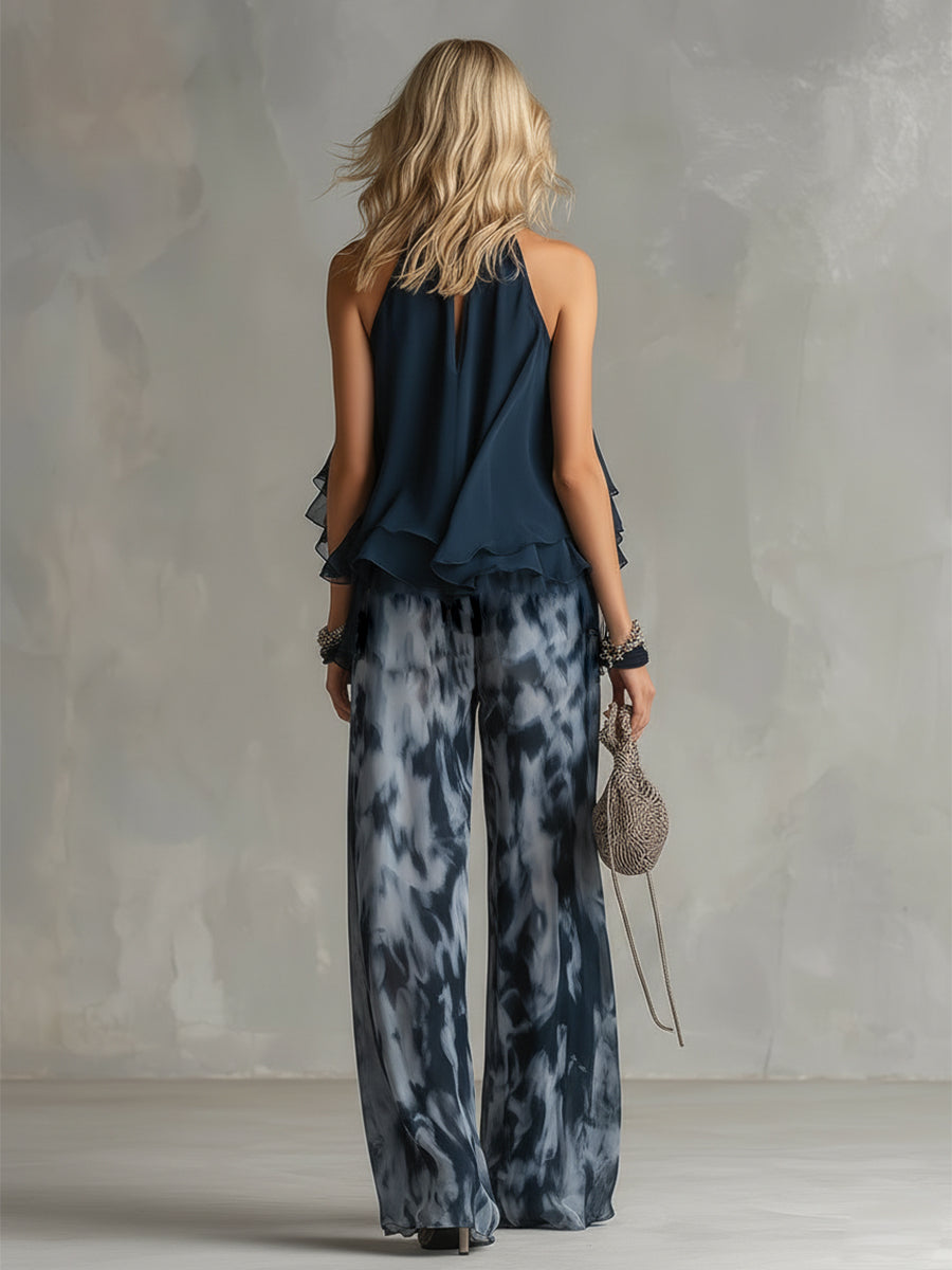 Luisa - Elegant chiffon dress with a high-necked top and wide-cut, patterned trousers.