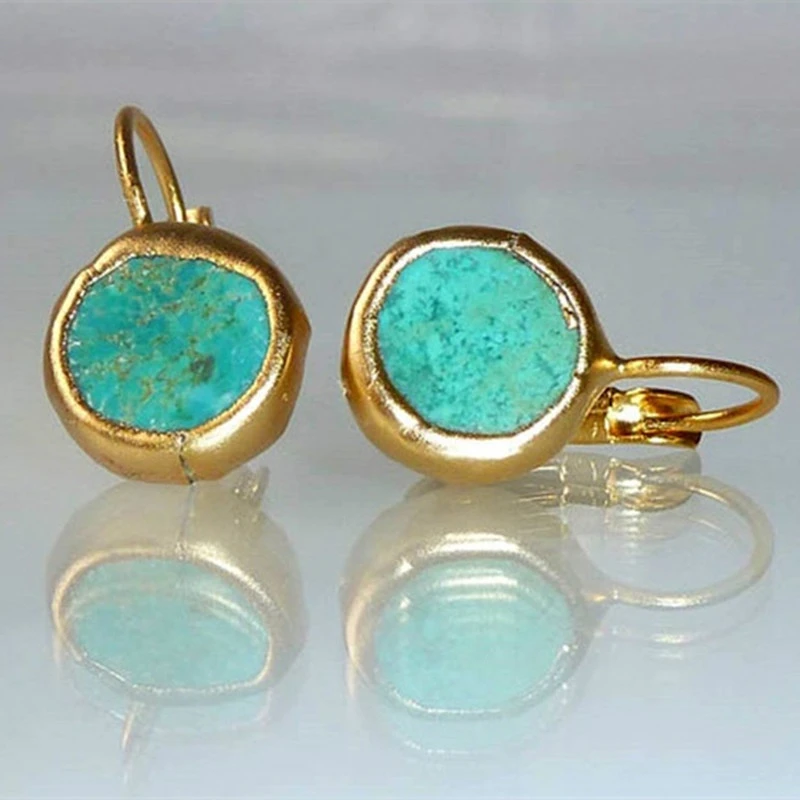 Boucles d'oreilles dorées ornées de pierres turquoise